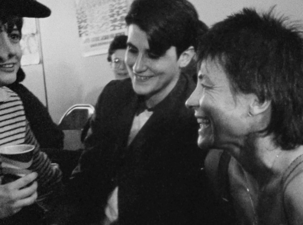 black and white photo of two women being interviewed